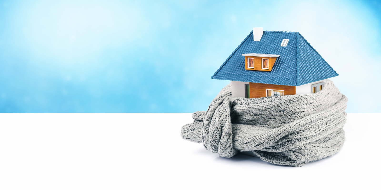 home insulation concept. house with scarf around